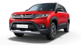 Front view of Maruti Suzuki Brezza 2026 model showing dual LED projector headlamps and chrome grille
